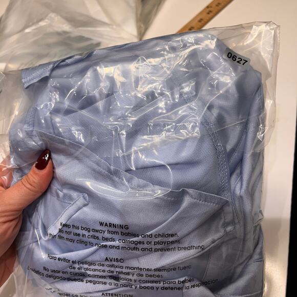 Chic Light Blue Mini Dress with Knot Detail - Picture 12 of 12